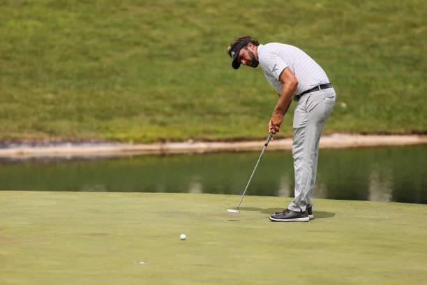 Curtis Thompson putts on the 12th green during the final round of the Price Cutter Charity Championship presented by Dr. Pepper at Highland Spring...