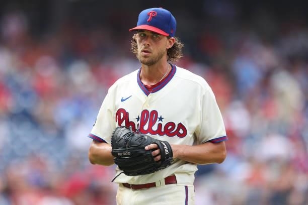 Pitcher Aaron Nola of the Philadelphia Phillies walks off the mound after being removed with two outs in the ninth inning of a game against the...