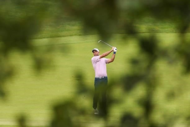 Steve Lewton of England plays his shot from the 14th hole during the final round of the Price Cutter Charity Championship presented by Dr. Pepper at...