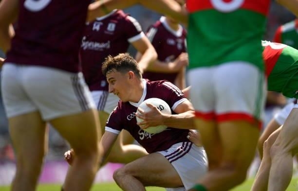 Dublin , Ireland - 25 July 2021; Matthew Tierney of Galway is surrounded by teammates and opposition players during the Connacht GAA Senior Football...
