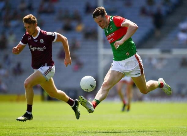 Dublin , Ireland - 25 July 2021; Matthew Ruane of Mayo in action against Dylan McHugh of Galway during the Connacht GAA Senior Football Championship...