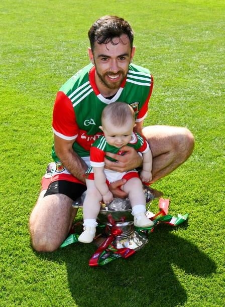 Dublin , Ireland - 25 July 2021; Kevin McLoughlin of Mayo and his nine month old daughter Saorla with the Nestor Cup after Connacht GAA Senior...