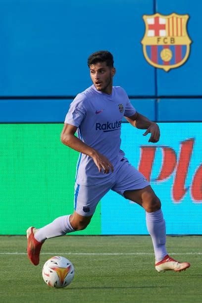 Nils Mortimer of Barcelona runs with the ball during the pre-season friendly match between FC Barcelona and Girona FC at Estadi Johan Cruyff on July...