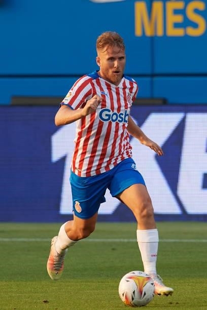 Samu Saiz of Girona runs with the ball during the pre-season friendly match between FC Barcelona and Girona FC at Estadi Johan Cruyff on July 24,...