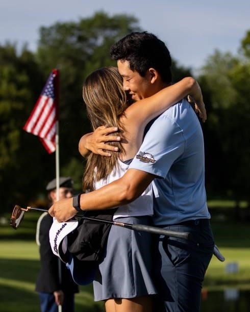 Dylan Wu Celebrates with his fiancé Margaret Burke on the 18th green after winning the final round of the Price Cutter Charity Championship presented...