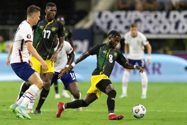 Jamaica's defender Oniel Fisher controls the ball as USA's forward Matthew Hoppe looks on during the Concacaf Gold Cup quarterfinal football match...