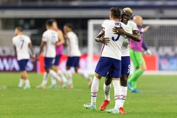 S forward Gyasi Zardes and defender Sam Vines celebrate after beating Jamaica 1-0 following the Concacaf Gold Cup quarterfinal football match between...