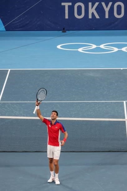 Serbia's Novak Djokovic celebrates after defeating Germany's Jan-Lennard Struff during their Tokyo 2020 Olympic Games men's singles second round...