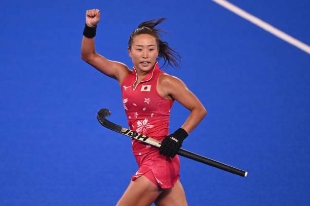 Japan's Shihori Oikawa celebrates after scoring against New Zealand during their women's pool B match of the Tokyo 2020 Olympic Games field hockey...