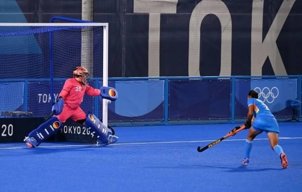 India's Gurjit Kaur misses a penalty shot as Germany's goalkeeper Julia Sonntag looks on during their women's pool A match of the Tokyo 2020 Olympic...