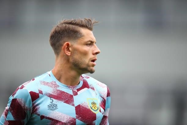 James Tarkowski of Burnley warms up ahead of the Pre Season Friendly match between Oldham Athletic and Burnley at Boundary Park on July 24, 2021 in...