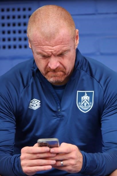 Sean Dyche the head coach / manager of Burnley on his mobile phone during the Pre Season Friendly match between Oldham Athletic and Burnley at...