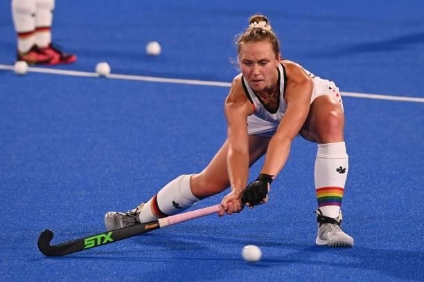 Germany's Nike Lorenz wears a rainbow-coloured captain band over a sock in support of the LGBTI movement and sexual diversity, during the warm-up...