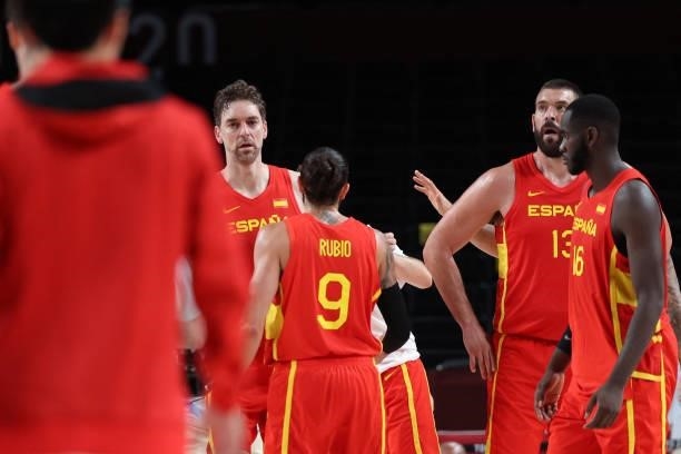 Spanish players stand on court after the men's preliminary round group C basketball match between Japan and Spain during the Tokyo 2020 Olympic Games...