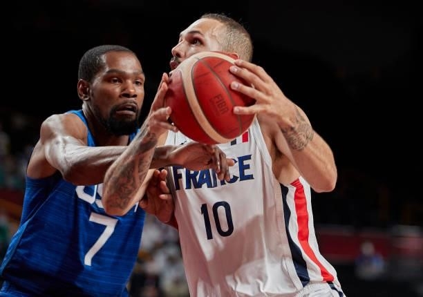 Evan Fournier of France and Kevin Wayne Durant of USA battle for the ball on day two in the Men's First Round Group A match between France and USA at...