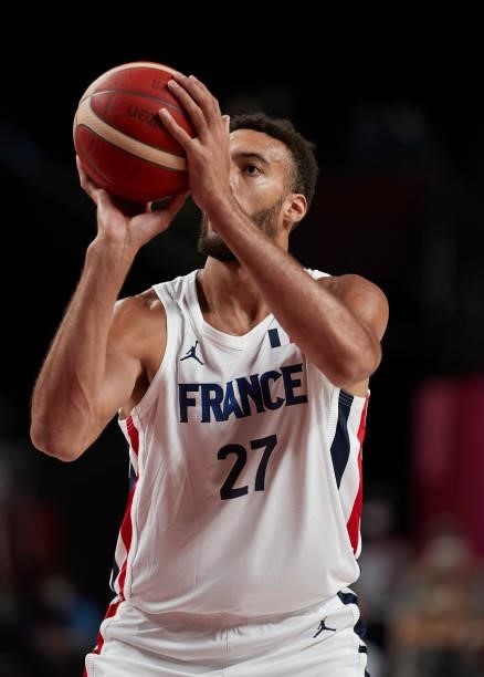 Rudy Gobert of France controls the ball on day two in the Men's First Round Group A match between France and USA at the Tokyo 2020 Olympic Games at...