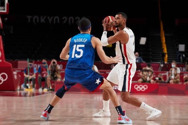 Timothe Luwawu of France and Devin Booker of USA battle for the ball on day two in the Men's First Round Group A match between France and USA at the...