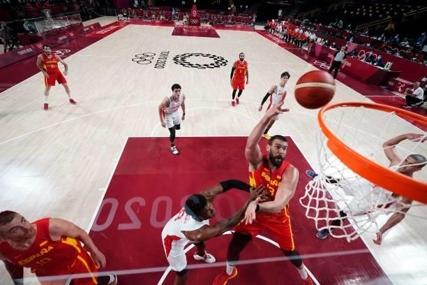 Spain's Marc Gasol goes to the basket past Japan's Rui Hachimura in the men's preliminary round group C basketball match between Japan and Spain...