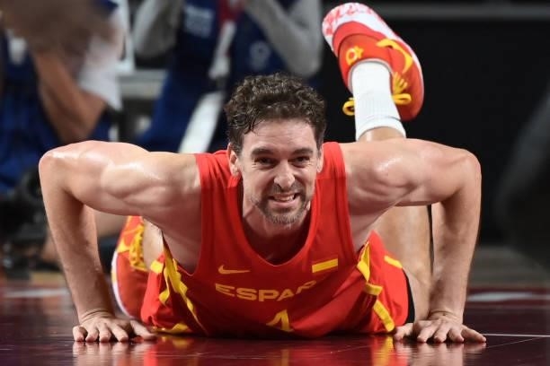 Spain's Pau Gasol Saez reacts after falling on the court during the men's preliminary round group C basketball match between Japan and Spain of the...