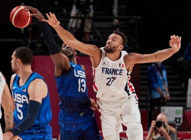 Rudy Gobert of France and Edrice Femi Adebayo of USA battle for the ball on day two in the Men's First Round Group A match between France and USA at...