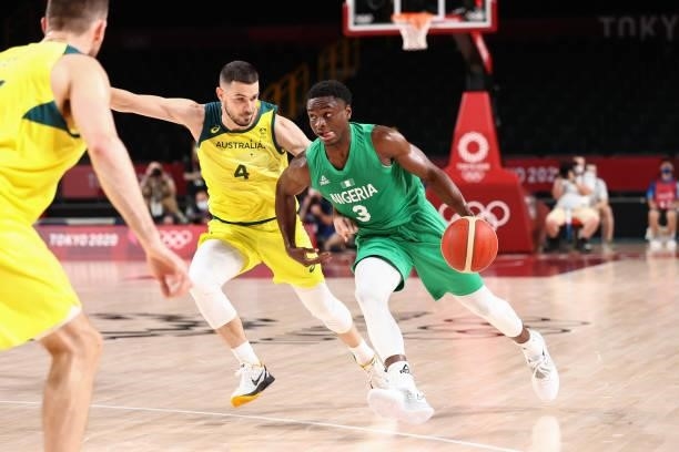 Calab Agada of the Nigeria Men's National Team drives to the basket against the Australia Men's National Team during the 2020 Tokyo Olympics on July...