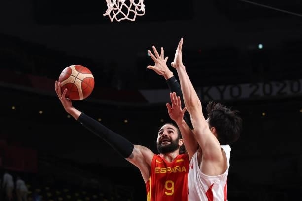 Spain's Ricky Rubio goes to the basket as Japan's Yudai Baba tries to block in the men's preliminary round group C basketball match between Japan and...