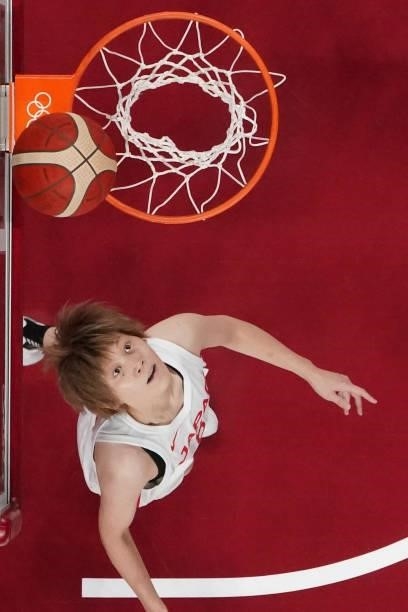 Japan's Maki Takada looks for a rebound during the women's preliminary round group B basketball match between France and Japan of the Tokyo 2020...