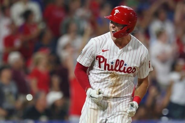Rhys Hoskins of the Philadelphia Phillies reacts after he hit a three-run home run in the sixth inning of a game against the Washington Nationals at...