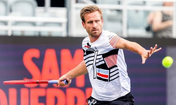 Peter Gojowczyk of Germany returns a shot against Sam Querrey of the United States at the Truist Atlanta Open at Atlantic Station on July 26, 2021 in...