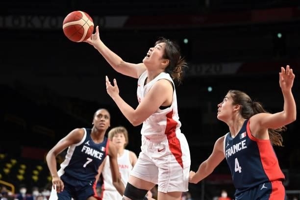 Japan's Moeko Nagaoka goes to the basket in the women's preliminary round group B basketball match between France and Japan during the Tokyo 2020...