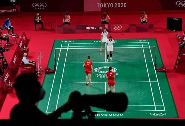 Photographer records the women's doubles badminton group stage match between Malaysia's Chow Mei Kuan and Malaysia's Lee Meng Yean, and Britain's...