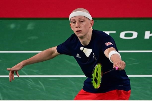 Britain's Toby Penty hits a shot to Germany's Kai Schaefer in their men's singles badminton group stage match during the Tokyo 2020 Olympic Games at...