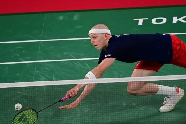 Britain's Toby Penty hits a shot to Germany's Kai Schaefer in their men's singles badminton group stage match during the Tokyo 2020 Olympic Games at...