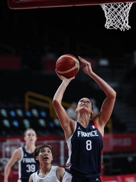 France's Helena Ciak goes to the basket past Japan's Rui Machida in the women's preliminary round group B basketball match between France and Japan...