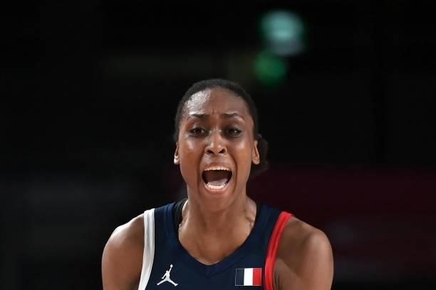 France's Sandrine Gruda reacts after a point in the women's preliminary round group B basketball match between France and Japan during the Tokyo 2020...
