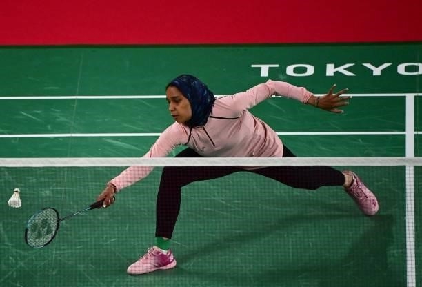 Egypt's Doha Hany hits a shot to Turkey's Neslihan Yigit in their women's singles badminton group stage match during the Tokyo 2020 Olympic Games at...
