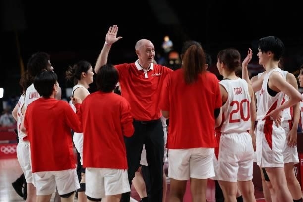Japan's coach Thomas Wayne Hovasse gestures to his players after their victory in the women's preliminary round group B basketball match between...