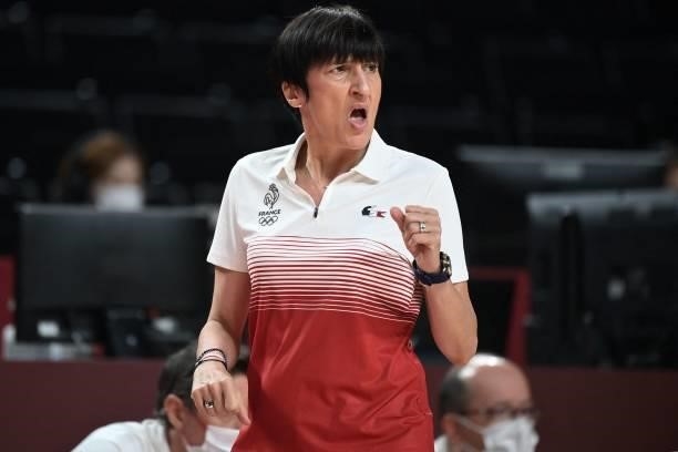 France's team coach Valerie Garnier gestures to her players in the women's preliminary round group B basketball match between France and Japan during...