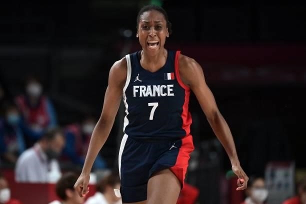 France's Sandrine Gruda reacts after a point in the women's preliminary round group B basketball match between France and Japan during the Tokyo 2020...