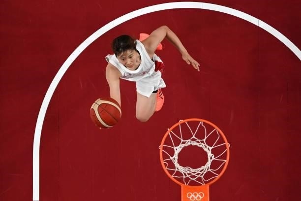 Japan's Nanako Todo goes to the basket in the women's preliminary round group B basketball match between France and Japan during the Tokyo 2020...