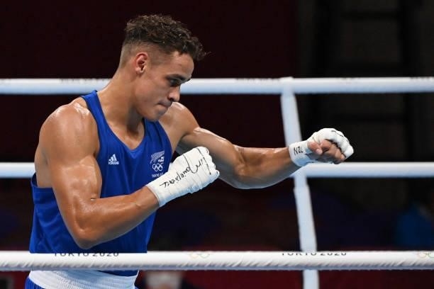 New Zealand's David Nyika fights Morocco's Youness Baalla during their men's heavy preliminaries round of 16 boxing match during the Tokyo 2020...