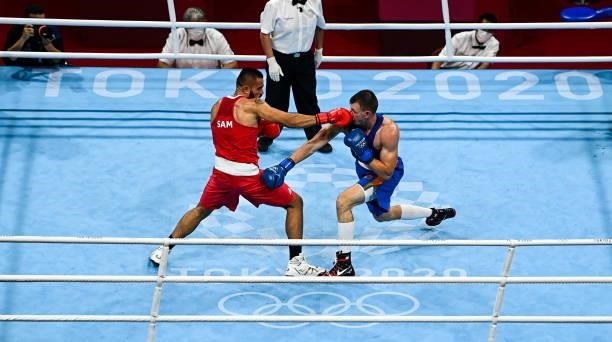 Tokyo , Japan - 27 July 2021; Ato Leau Plodzicki-Faoagali of Samoa, left, and Uladzislau Smiahlikau of Belarus during the Men's Heavyweight Round of...