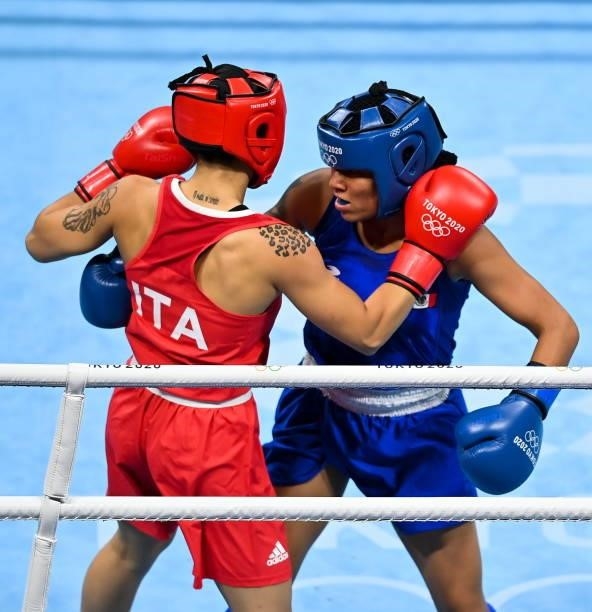 Tokyo , Japan - 27 July 2021; Rebecca Nicoli of Italy, left, and Esmeralda Falcon Reyes of Mexico during the Women's Lightweight Round of 32 bout at...