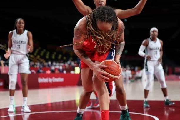 S Brittney Griner protects the ball from Nigeria's players in the women's preliminary round group B basketball match between Nigeria and USA during...