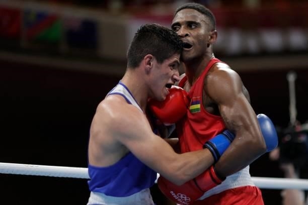 Mauritius' Merven Clair and Jordan's Zeyad Eishaih Hussein Eashash fight during their men's welter preliminaries round of 16 boxing match during the...
