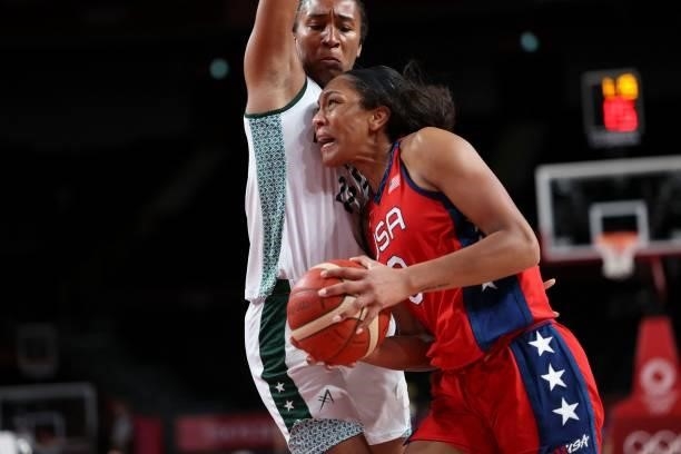S A'ja Wilson goes for the basket past Nigeria's Oderah Chidom in the women's preliminary round group B basketball match between Nigeria and USA...