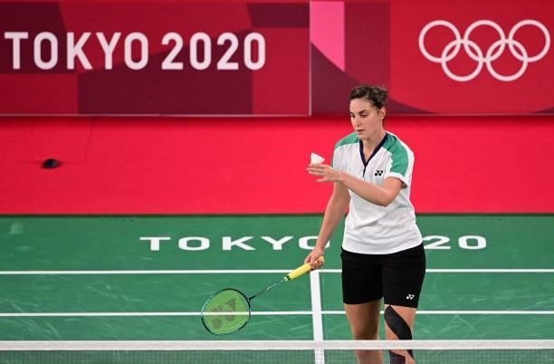 Israel's Ksenia Polikarpova serves to Hong Kong's Cheung Ngan Yi in their women's singles badminton group stage match during the Tokyo 2020 Olympic...
