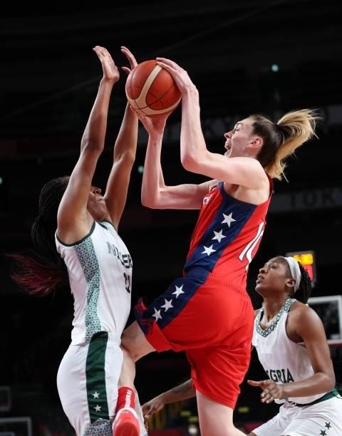 S Breanna Stewart goes to the basket past Nigeria's Oderah Chidom in the women's preliminary round group B basketball match between Nigeria and USA...