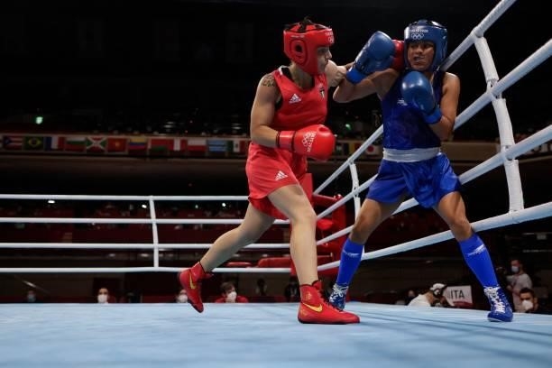 Italy's Rebecca Nicoli and Mexico's Esmeralda Falcon Reyes fight during their women's light preliminaries boxing match during the Tokyo 2020 Olympic...