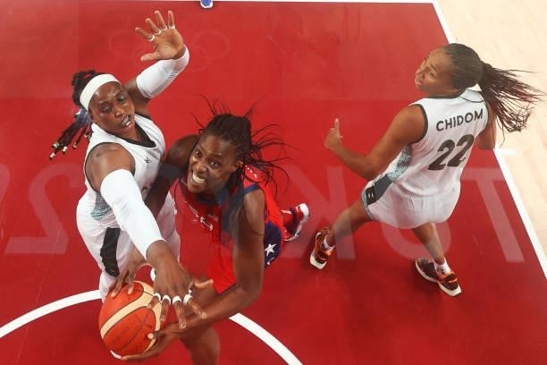 S Sylvia Fowles goes for the basket past Nigeria's Aisha Mohammed in the women's preliminary round group B basketball match between Nigeria and USA...
